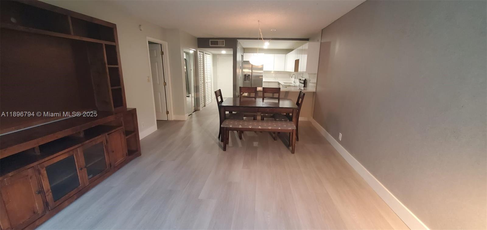 BUILDING FOUR OF RACQUET - Residential Lease