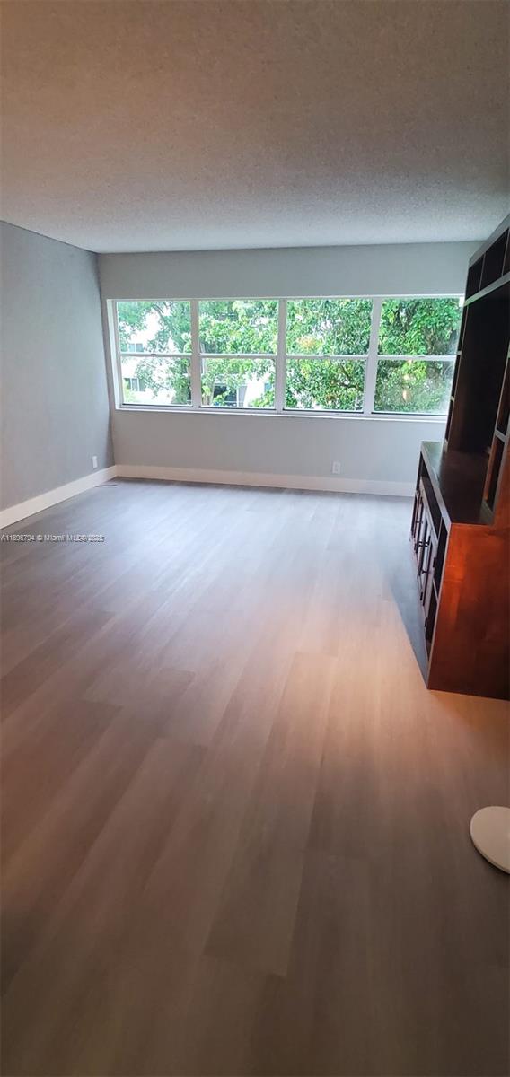 BUILDING FOUR OF RACQUET - Residential Lease