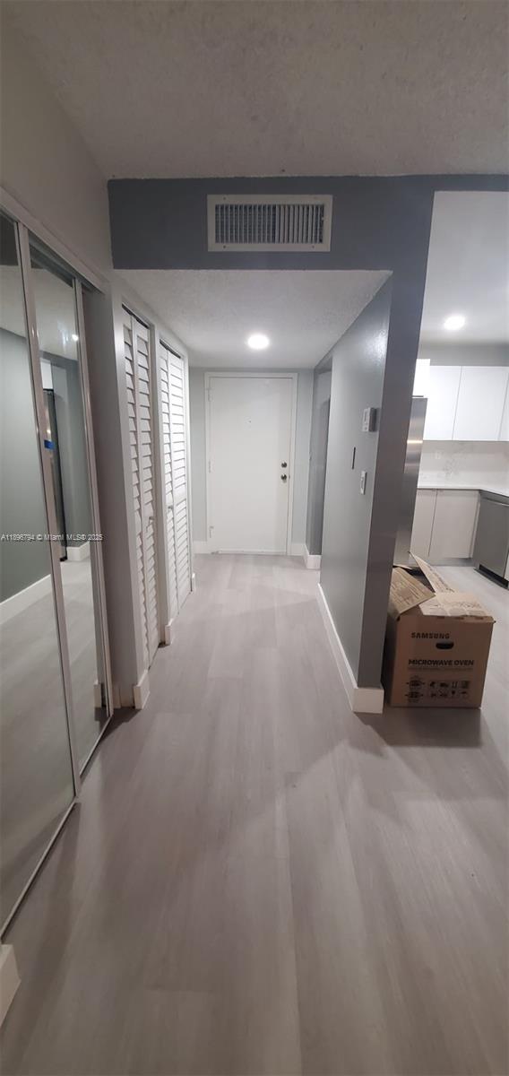BUILDING FOUR OF RACQUET - Residential Lease
