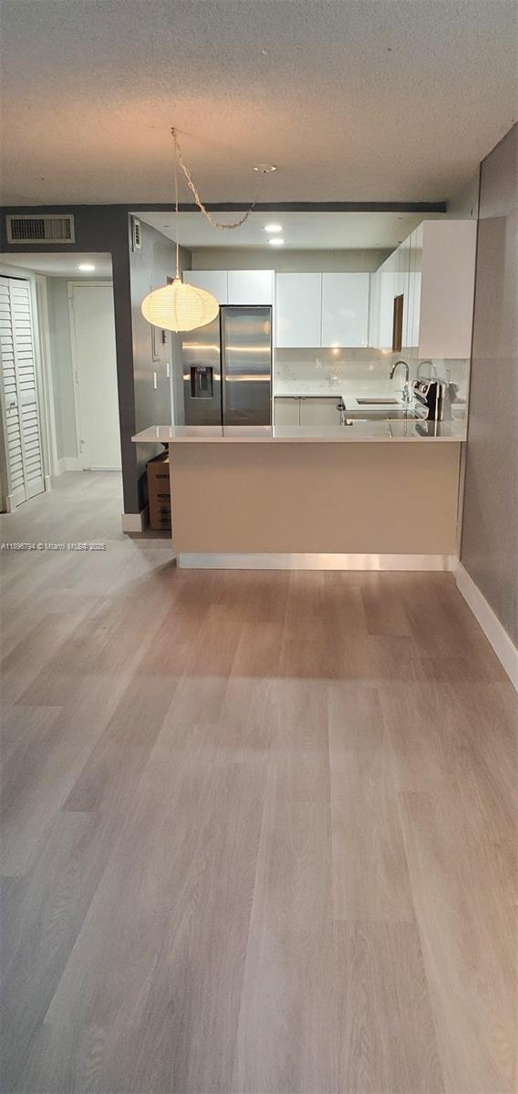 BUILDING FOUR OF RACQUET - Residential Lease