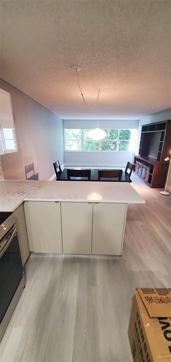 BUILDING FOUR OF RACQUET - Residential Lease