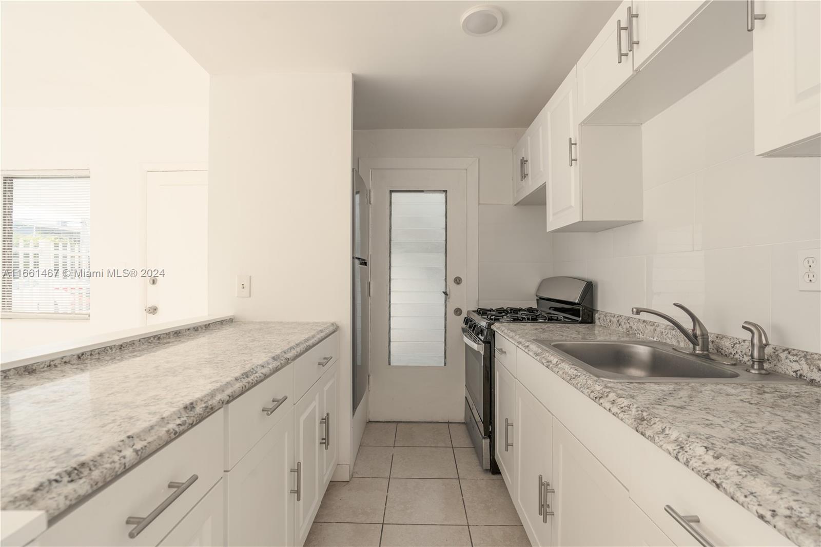 Remodeled 1 bedroom, 1 bathroom apartment in the heart of North Beach. Unit offers an open concept kitchen, custom cabinetry, custom countertop, stainless steel appliances and updated full bathroom with bath tub. Bedroom is very spacious and offers his and her closet. Rent includes 1 assigned parking and water. Building includes a washer/dryer area and lush landscapes. Minutes away from the beach, Publix, Normandy Isles, & Parkview Island Park
