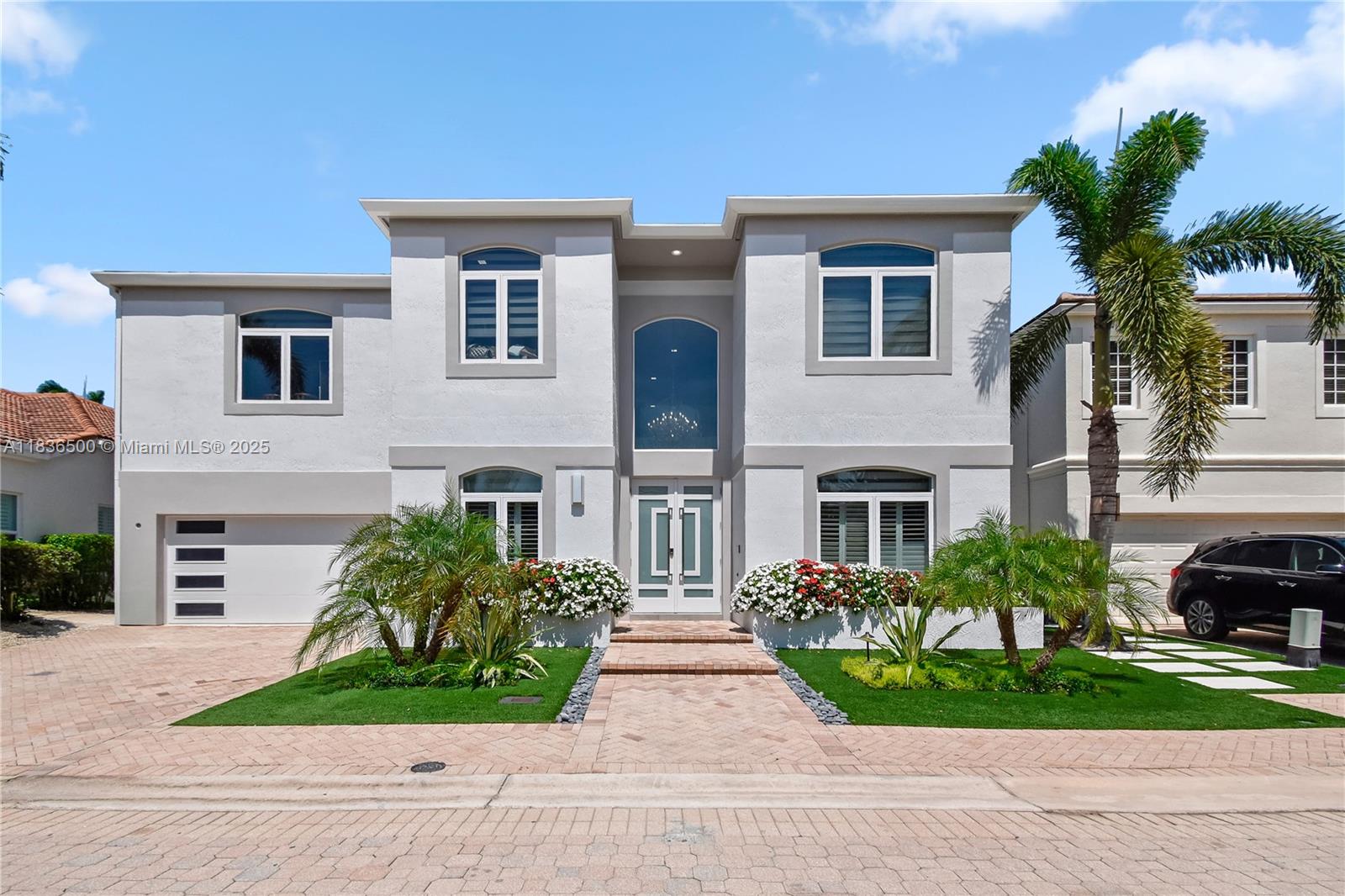 Rarely available and fully updated, this stunning two-story home located in one of Boca Raton’s most sought-after communities, Woodfield CC. Situated in the prestigious Mayfair section, this home has been completely renovated with the finest materials and meticulous attention to detail. Highlights include a newly installed standing seam metal roof, the house is flooded with natural light from all impact windows and doors, a gourmet kitchen with top-of-the-line appliances, & a glass-enclosed wine cellar. The outdoor living boasts a newly upgraded saltwater heated pool, expansive sun deck, and a fully equipped summer kitchen. Residents of Woodfield Country Club enjoy access to world-class amenities. Located near top-rated schools, major highways, shopping, dining, airports, & nearby beaches.