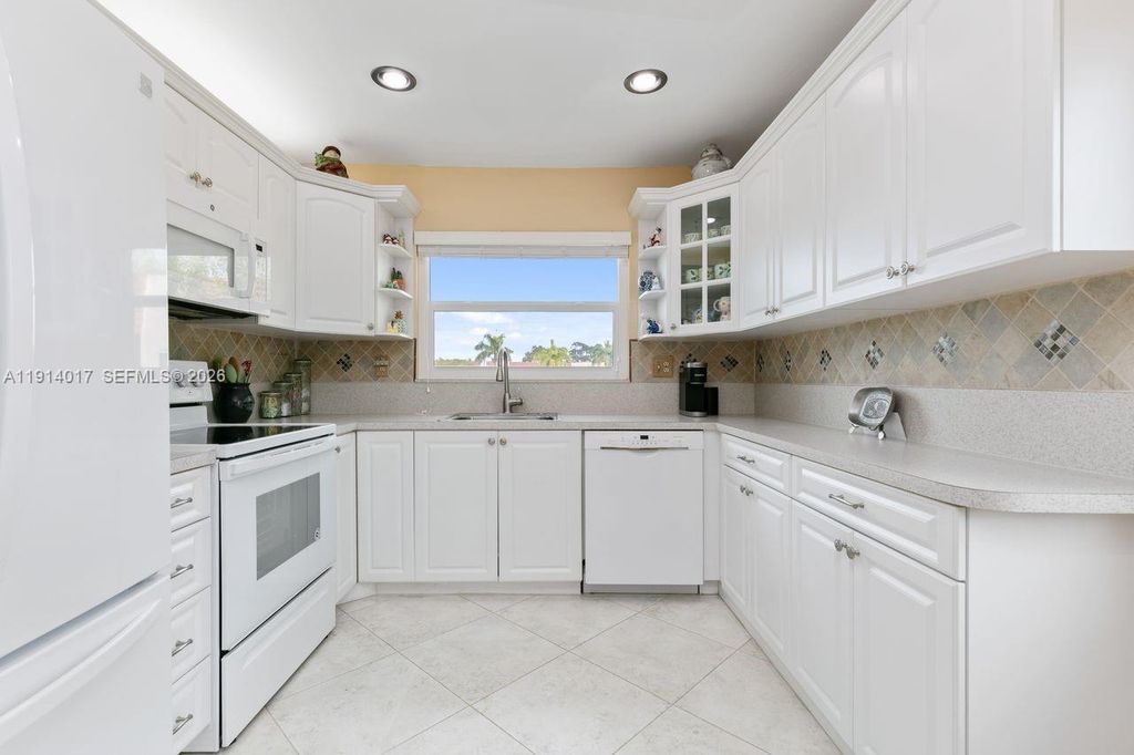 Photo of 9310 Sunrise Lakes Blvd #301, Sunrise, FL 33322 (MLS # A11914017)