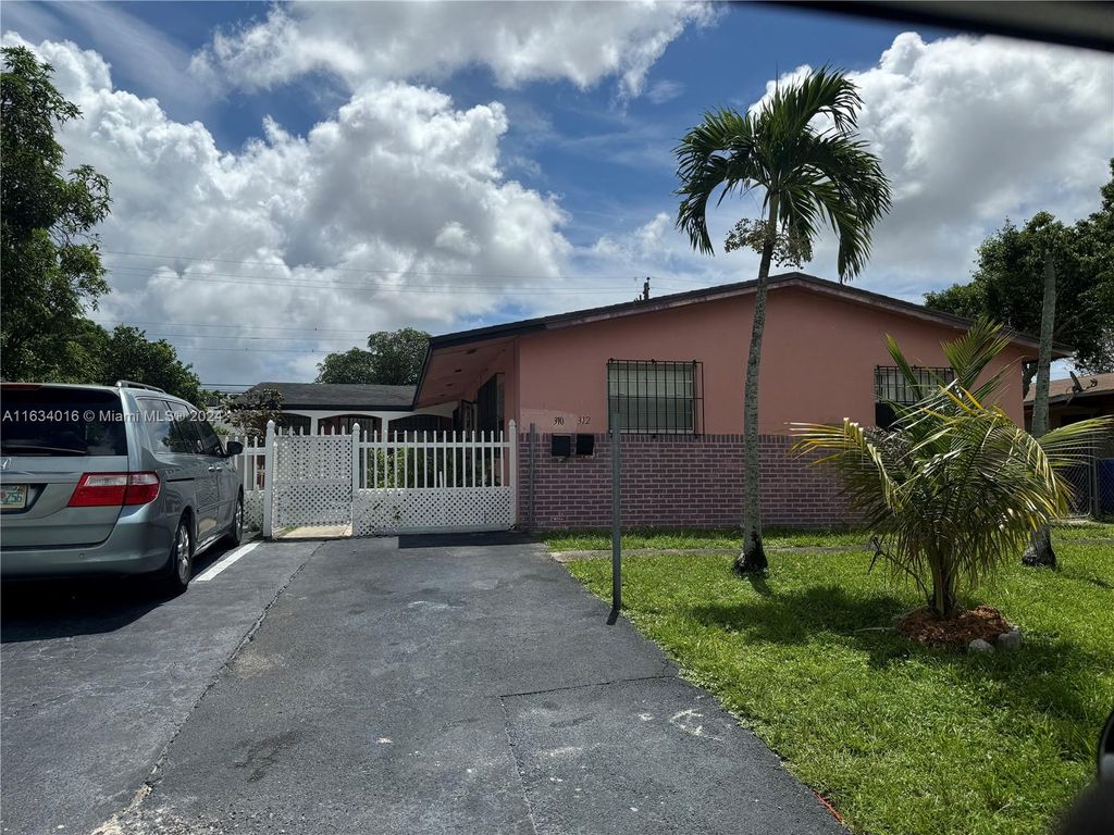 Photo of 310 SW 27th Ter #1-2, Fort Lauderdale, FL 33312 (MLS # A11634016)