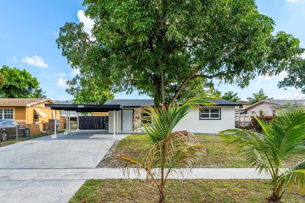 Photo of 1164 NW 45th Ave, Lauderhill, FL 33313 (MLS # A11998154)