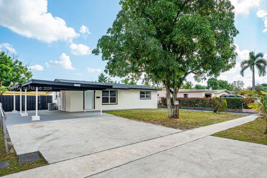 WELCOME HOME TO THIS BEAUTIFULLY RENOVATED 3-BEDROOM, 3-BATHROOM SINGLE-FAMILY RESIDENCE, UPDATED FROM TOP TO BOTTOM FOR MODERN LIVING! ENJOY PEACE OF MIND WITH A BRAND NEW ROOF (2025), IMPACT WINDOWS (2025), NEWER A/C (2022), AND NEW WATER HEATER (2025). INSIDE, THE HOME FEATURES BRAND-NEW MODERN VINYL FLOORING AND A STUNNINGLY UPDATED KITCHEN COMPLETE WITH QUARTZ COUNTERTOPS, STAINLESS STEEL APPLIANCES, AND SHAKER CABINETRY. ALL THREE BATHROOMS HAVE BEEN FULLY UPDATED WITH FRESH, CONTEMPORARY FINISHES. THE INDOOR LAUNDRY ROOM HAS A BRAND-NEW WASHER AND DRYER FOR EVEN MORE CONVENIENCE. OUTSIDE, THE HOME HAS BEEN FRESHLY PAINTED AND OFFERS EXCEPTIONAL PARKING WITH TWO DRIVEWAYS AND A CARPORT THAT HAS ROOM FOR UP TO SEVEN VEHICLES. THIS MOVE-IN-READY HOME TRULY HAS IT ALL—STYLE, COMFORT, AND UPGRADES THROUGHOUT. LOCATED JUST 20 MINUTES FROM THE OCEAN, THIS PROPERTY OFFERS INCREDIBLE LIFESTYLE AND INVESTMENT POTENTIAL. WHETHER YOU’RE LOOKING FOR YOUR NEXT HOME OR A HIGH-DEMAND SHORT-TERM RENTAL, THIS ONE CHECKS EVERY BOX!