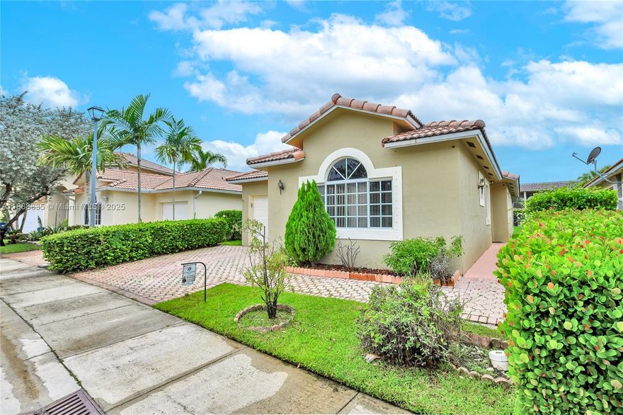 Welcome to Turtle Run! Charming canal-front home in the heart of Weston featuring 3 bedrooms, 2 baths, and a 1-car garage. The modern kitchen offers stainless steel appliances and granite countertops, with tile floors in main areas and laminate in bedrooms. Both bathrooms are beautifully renovated, making this home truly move-in ready. Located near top-rated schools, Turtle Run is ideal for families. Residents enjoy exclusive access to the Bonaventure Town Center Club, featuring a gym, Olympic-sized pool, tennis, racquetball, and bowling—available as of December 7th, 2025.