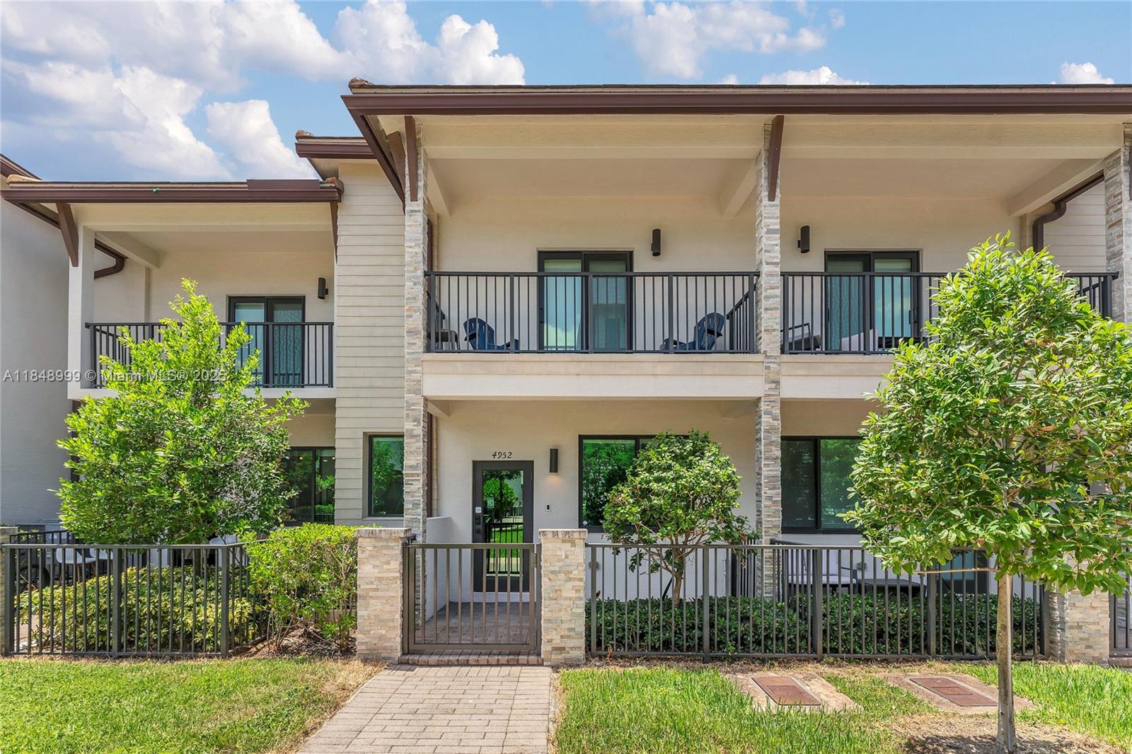Welcome to this gorgeous 2 story, 3 bed/2.5 bath (2 remodeled) townhouse with a 2 car garage at Urbana-Downtown Doral. Featuring a spacious floor plan including an open kitchen w/SS appliances, quartz counters & a large island for family gatherings. Go up the stained wooden stairs & be dazzled with the sleek porcelain floors (no carpet). Spacious primary bedroom has an ensuite double sink bathroom, walk-in closet & a private balcony. Enjoy resort-style amenities: Pool, fitness center, basketball, indoor running track, splash park, party room, game rooms +more. The perfect blend of contemporary style & comfort all within walking distance to lots of dinning/entertainment options, as well as Publix & Downtown Doral Charter Elementary School. Full impact windows/doors & not on a flood zone!