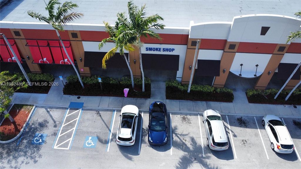 Photo of 6401 n university Dr, Tamarac, FL 33321 (MLS # A11982489)