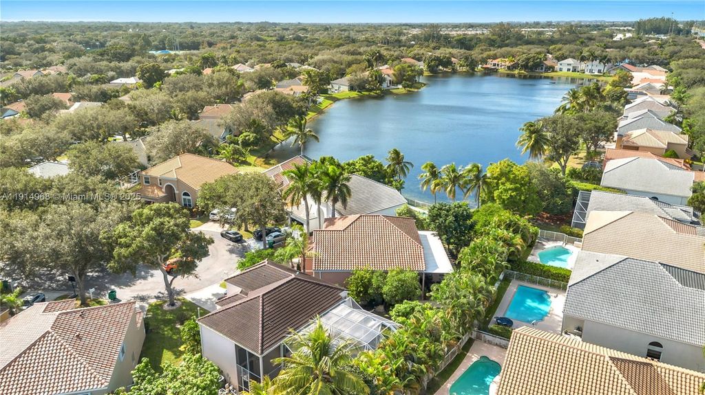 Photo of 7908 NW 63rd Way, Parkland, FL 33067 (MLS # A11914968)