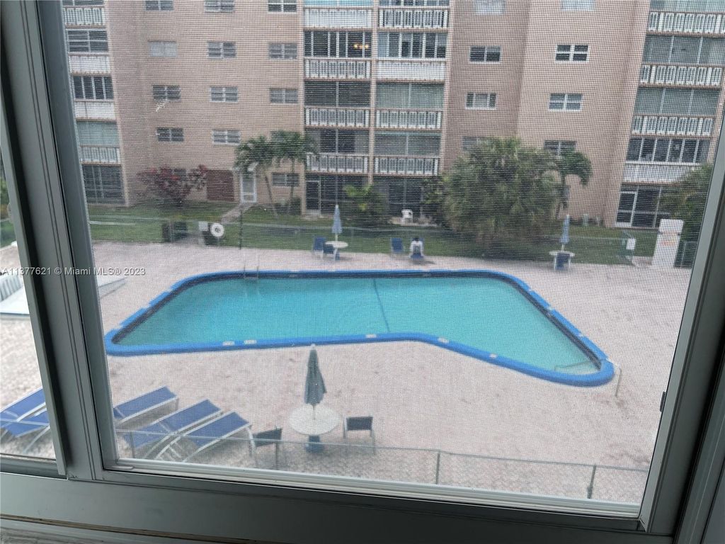 Photo of 319 NE 14th Ave #306, Hallandale Beach, FL 33009 (MLS # A11377621)