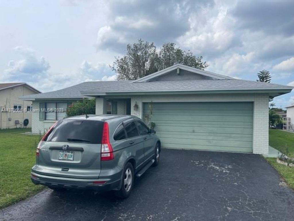 Photo of 9623 NW 82nd St, Tamarac, FL 33321 (MLS # A11379666)