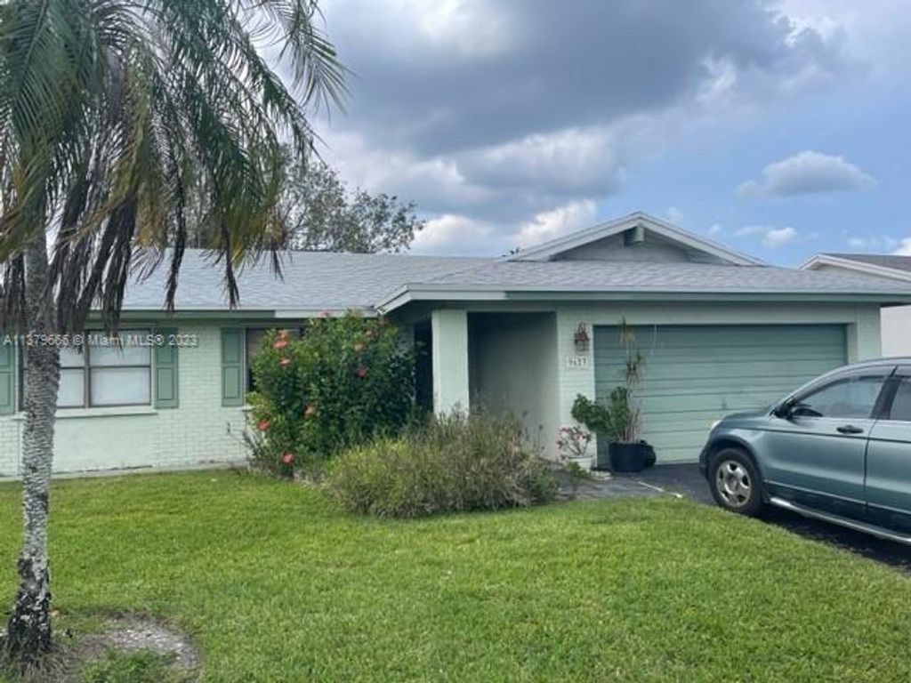 Photo of 9623 NW 82nd St, Tamarac, FL 33321 (MLS # A11379666)