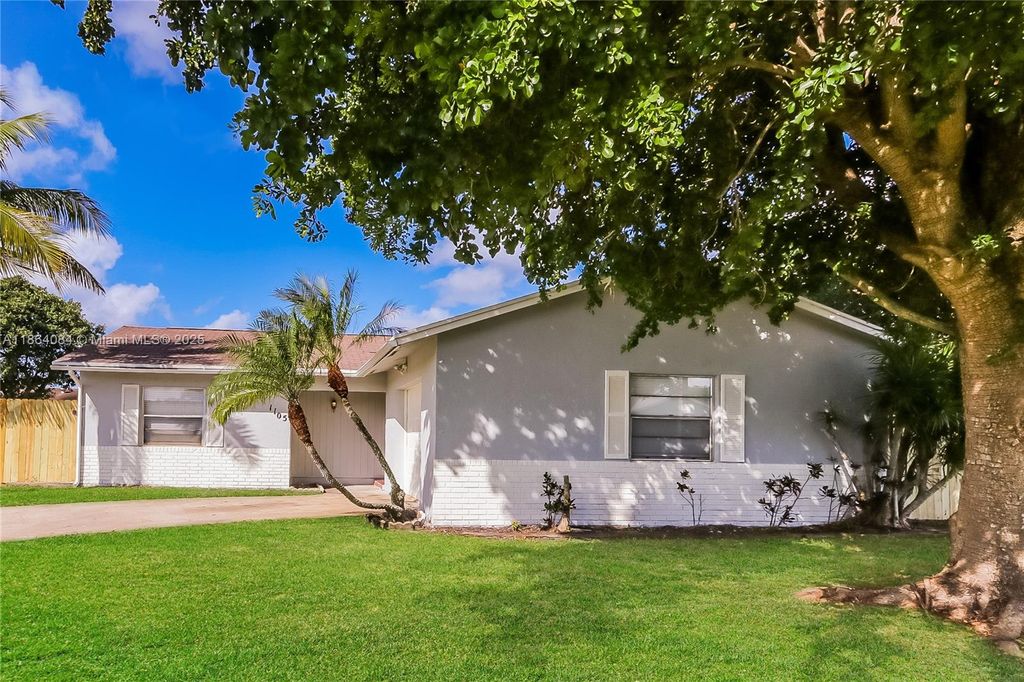 Photo of 1105 Sonata Way, Royal Palm Beach, FL 33411 (MLS # A11864084)