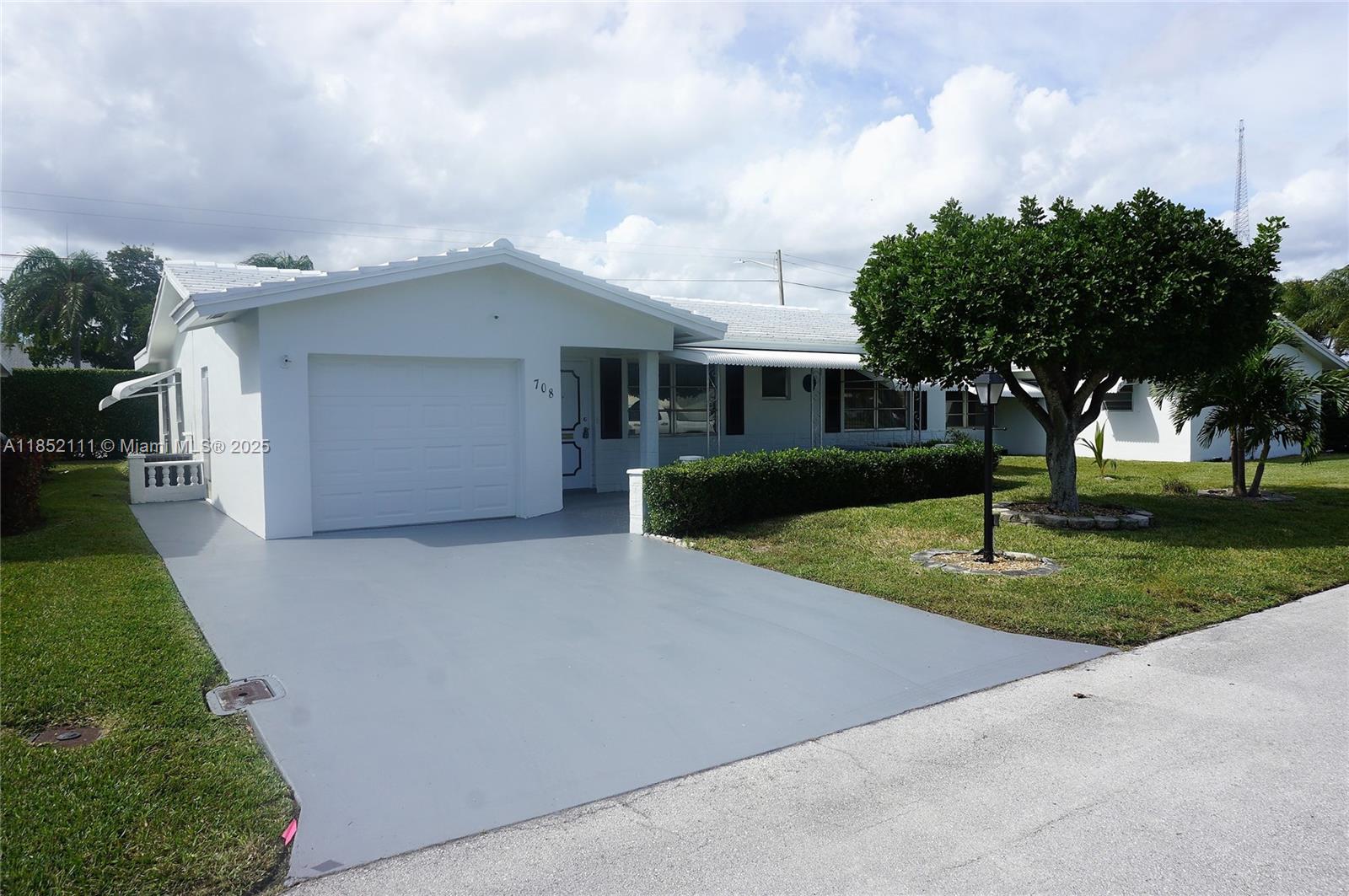 Beautiful and ample with great curb appeal. This updated 2 bedrooms, 2 bath home with very large den (may serve as 3rd bedroom) and 1 car garage has plenty to offer in Leisureville. One of the largest models in the community. Updated kitchen with breakfast nook includes granite counter tops with oversized built-in serving area. All appliances are stainless steel. Master bedroom has good-sized walk-in closet with updated bathroom. Ceramic tiles throughout. Freshly painted inside with newer full-size washer/dryer in garage. Active Senior community with many amenities and close to beaches, Publix, Home Depot, etc. HOA approval required.