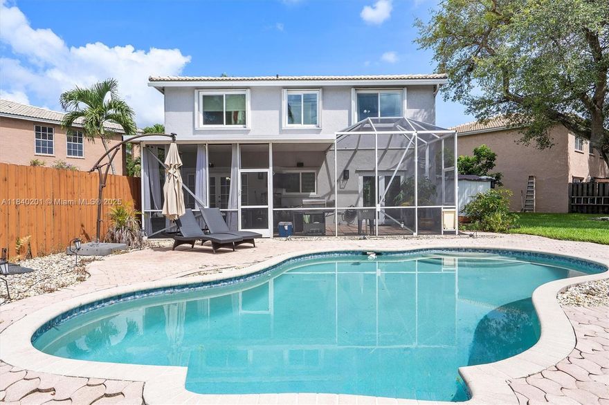 BRAND NEW ROOF! Beautifully renovated 2-story home 3 bed/2.5 bath & pool in desirable Forest Lake community of Cooper City. Situated on corner lot in a quiet cul-de-sac, home features open-concept kitchen with quartz countertops, new stainless steel appliances, tile flooring on the first floor with engineered hardwood upstairs. Enjoy a spacious, fully fenced backyard with a screened-in patio and sparkling pool—perfect for entertaining! Additional features include a 2-car garage, full impact windows & doors and accordion shutters, washer & dryer 2024. Ideally located in the heart of Cooper City, zoned for top-rated schools and close to shopping, dining, and houses of worship. Bundled service pricing available for buyers. Connect with the listing agent for details.