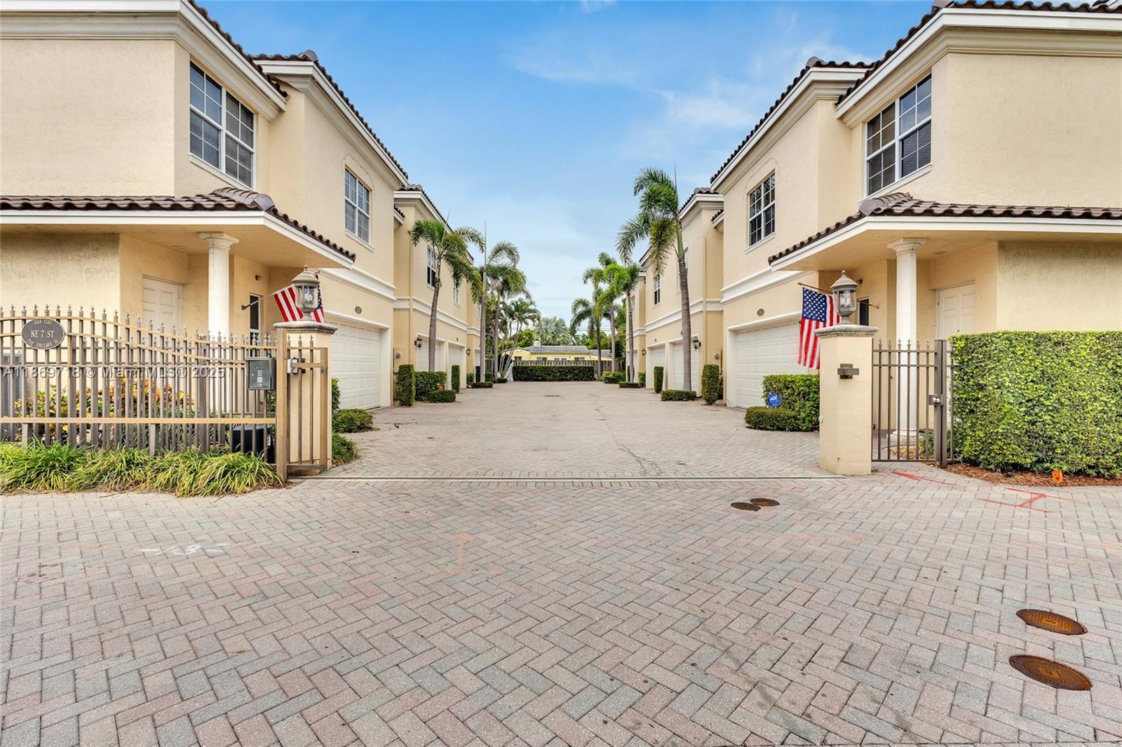 FANTASTIC OPPORTUNITY TO GRAB YOUR DREAM HOME IN VICTORIA PARK! BUILT IN 2002, THE ENCLAVE II IS A SMALL, CLOSE-KNIT COMMUNITY OF 8 FABULOUS TOWNHOMES NESTLED BEHIND A PRIVATE GATED COMMUNITY. **GORGEOUS CORNER UNIT WITH 3 BEDROOMS, 2.5 BATHS WITH A 2-CAR GARAGE.** OPEN FLOOR PLAN WITH VOLUME CEILINGS! BRAND NEW ROOF IN AUGUST 2025, AC REPLACED IN 2023, ALL HURRICANE WINDOWS AND DOORS. BRAND-NEW CARPET UPSTAIRS. THE KITCHEN IS WIDE OPEN WITH A VIEW OF THE GORGEOUS PATIO WITH 9 GROWN PALM TREES FOR SHADE AND COMFORT. THE MAIN BEDROOM IS 27 X 17.5 WITH A PRIVATE BALCONY. THE HOA IS ONLY $300 PER MONTH. NATURAL LIGHTING THROUGHOUT! VERY CLOSE TO BEACHES, DOWNTOWN, AND THE FAMOUS LAS OLAS SHOPS AND RESTAURANTS. THE LOFT AREA UPSTAIRS CAN BE USED AS THE 3RD BEDROOM, GYM, OFFICE OR MEDIA ROOM.
