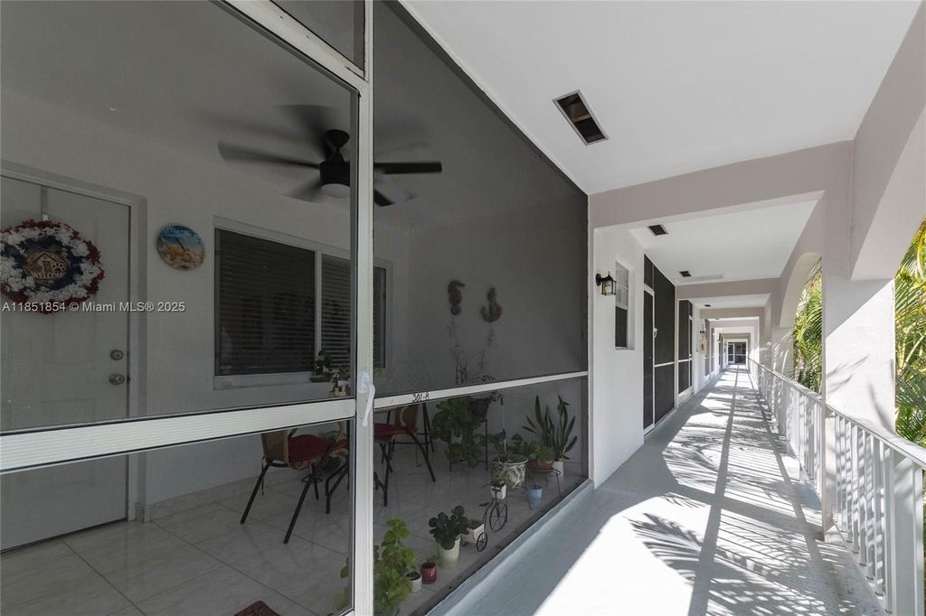 Photo of 581 Blue Heron Dr #301-B, Hallandale Beach, FL 33009 (MLS # A11851854)