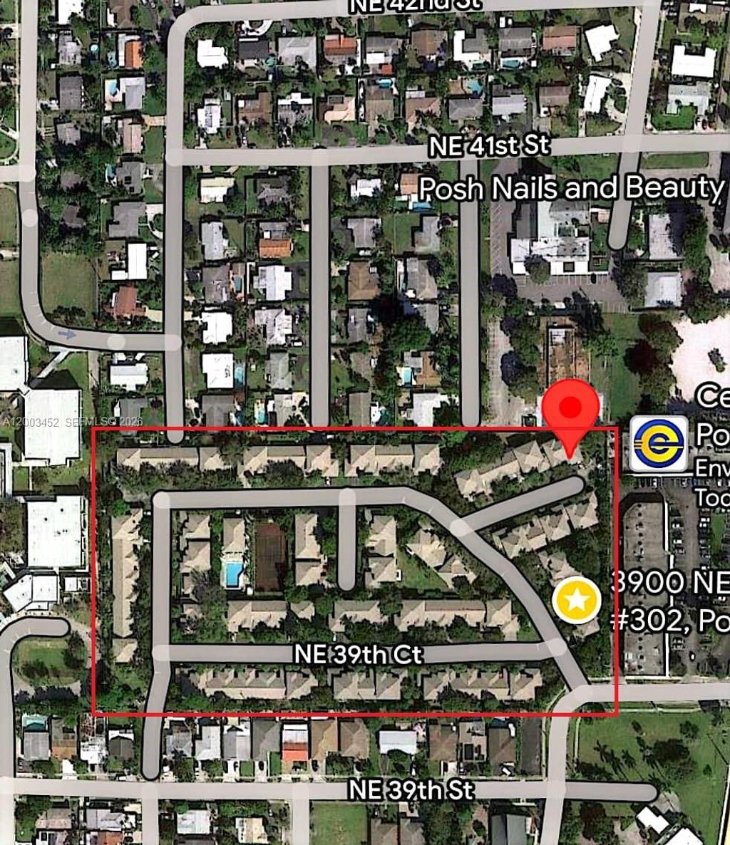 Photo of 1821 NE 40th Ct #302, Pompano Beach, FL 33064 (MLS # A12003452)