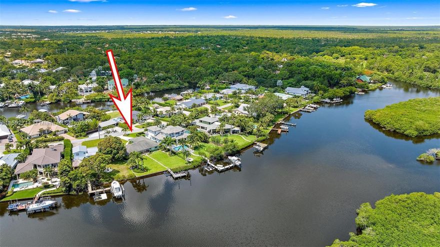 The property includes a private boat dock with direct access to the Loxahatchee River, as well as plenty of green space and a screened in patio/lanai.100' of waterfront located in Martin County, Jupiter with no HOA. Interior features of the newly remodeled home include new cabinetry, hardware, quartzite countertops/island, stainless steel appliances, interior/closet doors, LVP flooring, tile flooring, light fixtures, ceiling fans, and paint in & out. Bathrooms include marble counters, new vanities & tile. Primary Bedroom offers a walk-in closet & ensuite bath. Impact windows-2004, impact front door and slider doors-2024. Hot water heater-2024, boat dock-2018, and laundry room-washer/dryer-2022/2024. Buyer to verify all measurements & data. Information deemed reliable but not guaranteed.