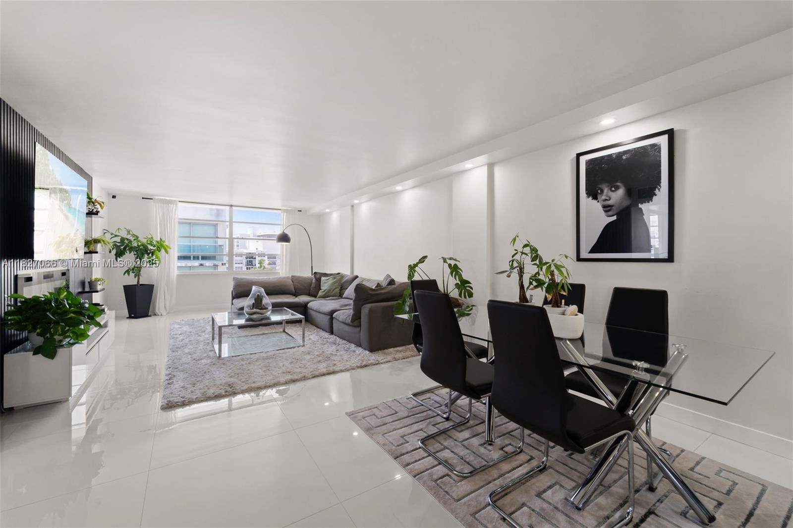 Modern, fully renovated 2BD/2BA in Bay Harbor Islands offering 1,300 SF of upscale living. This sunlit home features white tile floors, recessed lighting, floor-to-ceiling windows, and a sleek black-and-white kitchen with stainless steel appliances. Bathrooms boast spa-style showers, modern vanities, and matte black finishes. Enjoy a custom walk-in closet, large balcony, new A/C, assigned parking, and designer touches throughout. Walk to shops, markets, dining, and Bal Harbour. No pets/smoking. 12-month lease; tenant pays electric only. Water, internet, and more included.
