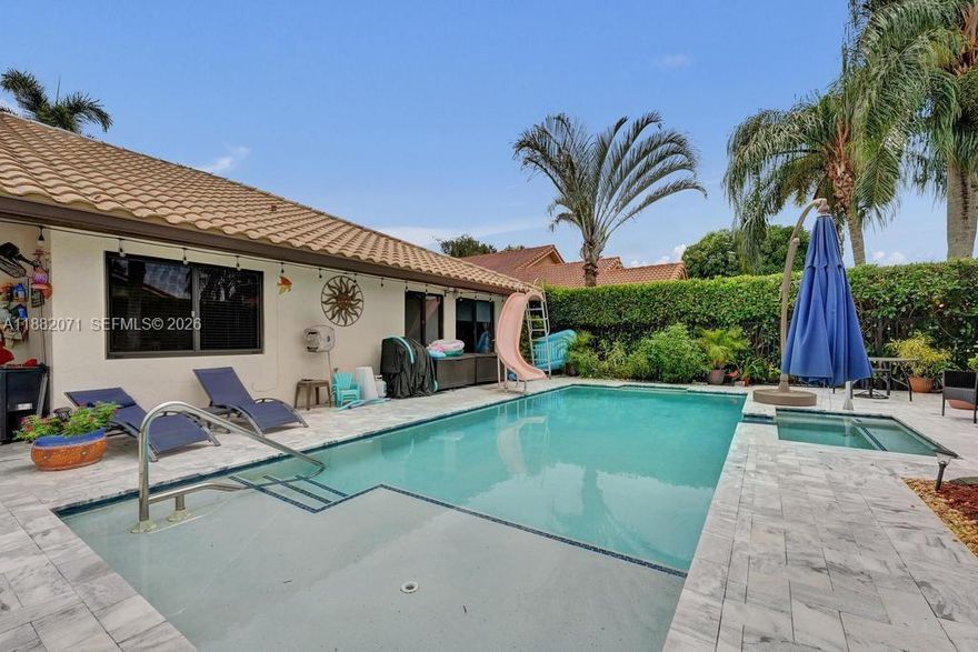 Welcome to this beautifully maintained 4-bedroom, 2-bath single story pool home located in the highly desirable Forest Ridge community. Featuring a split floor plan and open, inviting living spaces, this home offers both privacy and flexibility for everyday living, entertaining, and hosting guests. The remodeled kitchen and bathrooms, paired with a freshly painted interior, create a bright, move-in-ready atmosphere. Enjoy outdoor living in your own backyard retreat, complete with a heated saltwater pool and spa (2021) with marble decking - perfect for relaxing weekends, outdoor gatherings, and year round enjoyment. Recent improvements include impact windows and doors (2019), a fence installed in 2021, a 2009 roof, and a home that has been thoughtfully and consistently maintained. Forest Ridge has low HOA fees, no HOA approval process, and exceptional amenities including a community pool, pickleball, tennis, and basketball courts. Surrounded by majestic oak trees and lush landscaping, the neighborhood offers a peaceful setting with convenient access to Bamford Sports Complex, the Davie Multi-Purpose Center, and Tree Tops Park - providing endless opportunities for recreation and outdoor enjoyment. A rare opportunity to enjoy comfort, convenience, and lifestyle in one of Davie's most sought-after​​‌​​​​‌​‌​​​‌‌​​​‌‌‌​​‌​​‌‌​​​​ communities.