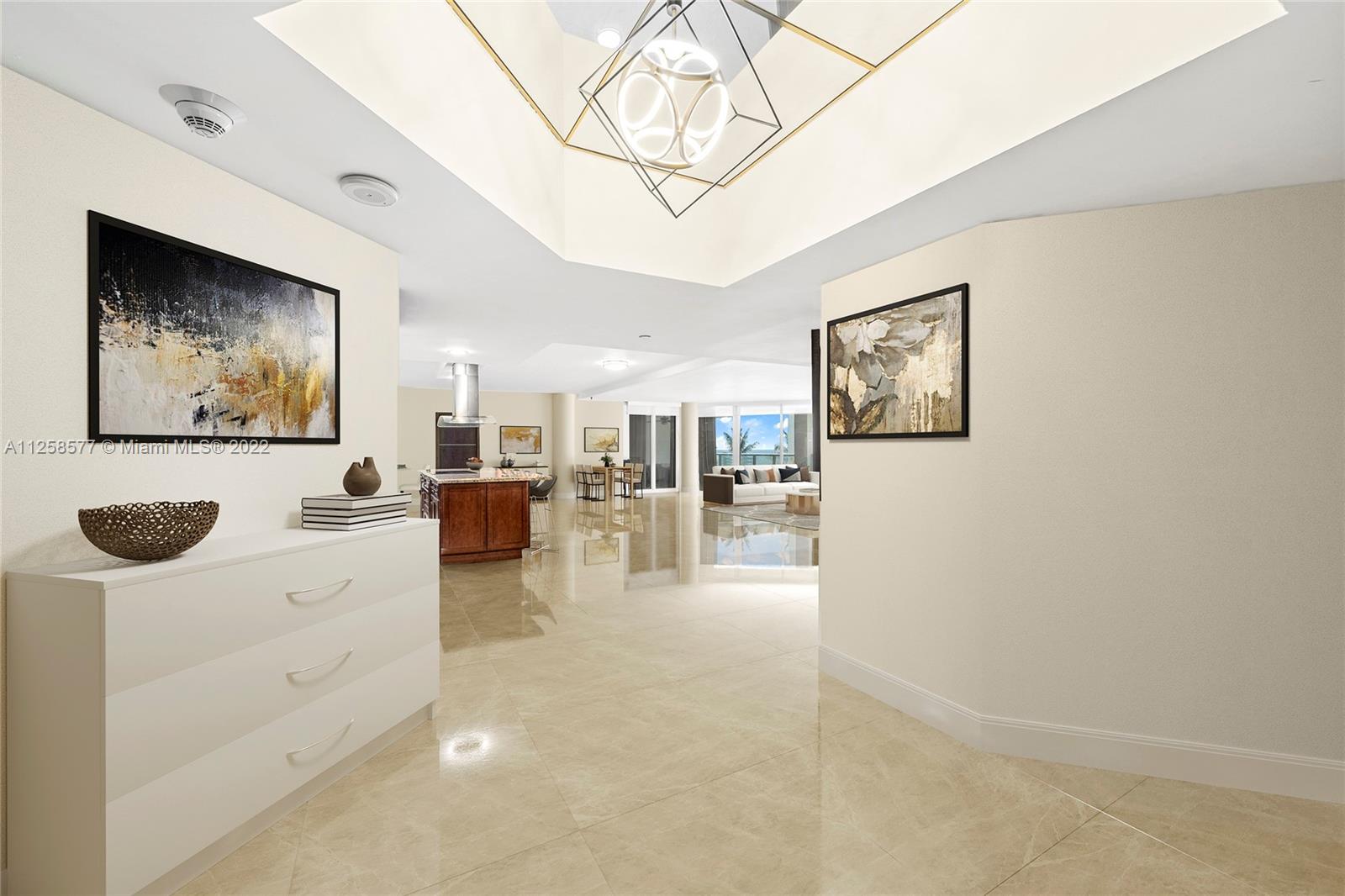 Oceanfront gem in an unbeatable location with oversized terrace in Sunny Isles Beach. Atlantic views
and ample natural light throughout this remodeled 3-bed, 3.5-bath residence spanning 2,970 sq. ft. The
spacious, remodeled unit in “Florida’s Riviera” features an open-concept floor plan with the living room
and main master suite opening up to an expansive wraparound terrace with views of the ocean. Custom
kitchen boasts large center island with breakfast bar, stainless-steel appliances and wine fridge. Master
bathroom with travertine, dual-sinks and large jacuzzi tub, while second master bedroom includes an
office nook. Resort-style living at Oceania offers amenities such as beach access, fitness center, spa, tennis, basketball and racquetball courts, private
marina, and more.