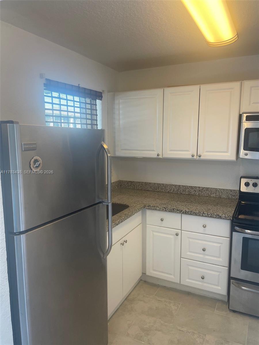 SUNRISE LAKES 49 CONDO - Residential