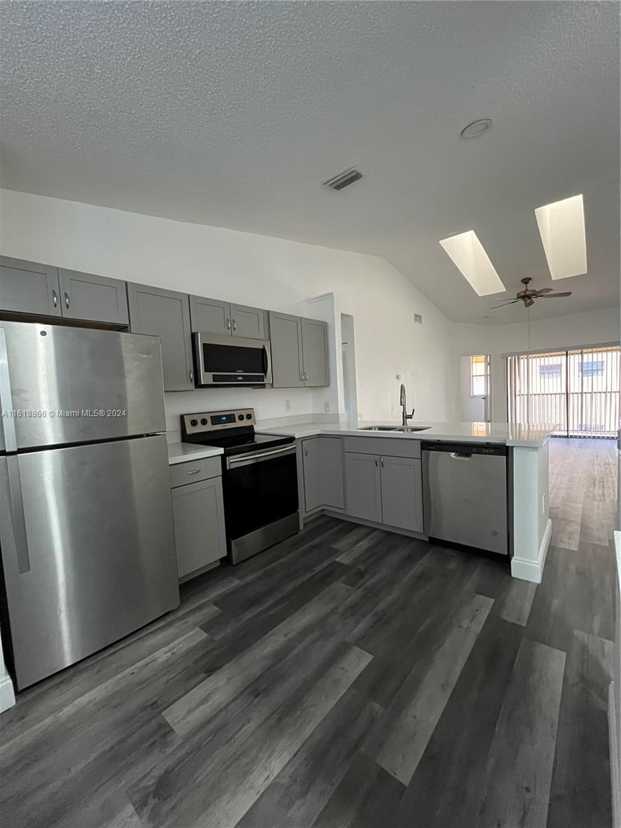Spacious and beautiful 2 Bedroom and 2 Bath condominium in Lauderhill. Completely updated, high ceilings, stainless steel appliances and new AC unit. Washer and Dryer. 2nd floor unit with convenient access from the first floor.