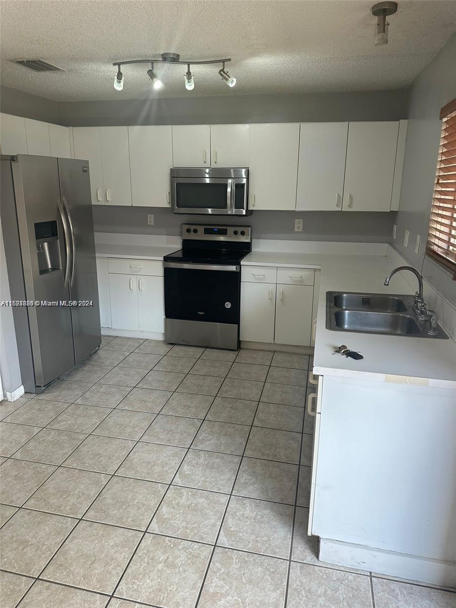 Photo 2 of 17 of 17769 SW 139th Ct 0 townhome