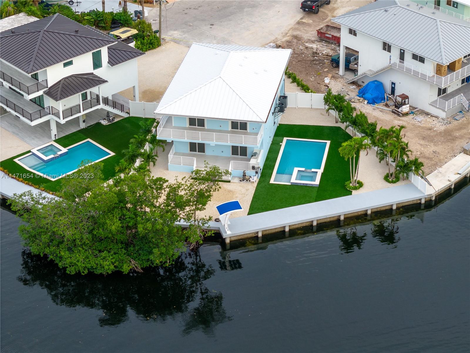 Property for Sale at 107 Azalea St St, Plantation Key, Miami-Dade County, Florida - Bedrooms: 5 
Bathrooms: 3  - $2,599,999