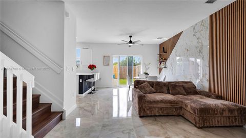 Photo of 11968 NW 46th St, Coral Springs, FL 33076 (MLS # A11882788)