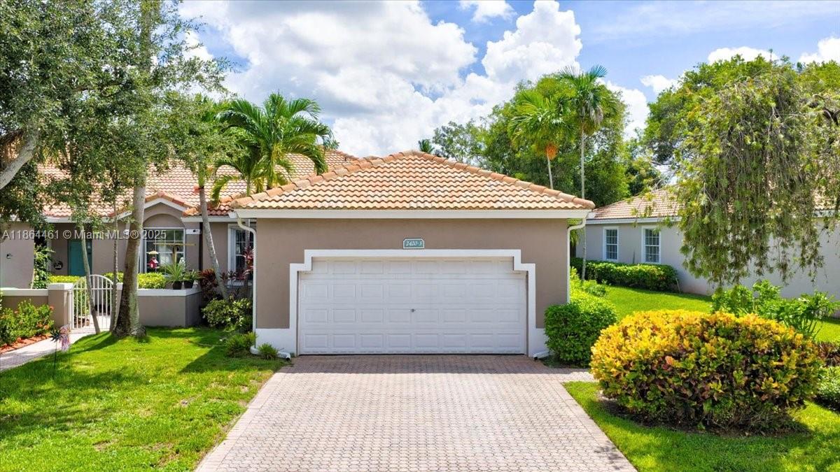 FHA/VA accepted! Welcome to this 3-bedroom, 2-bathroom corner villa in a highly sought-after gated community in Sunrise, FL! One of the largest lots in the community with 10x25 screened-in patio as well. Enjoy the convenience of a 2-car garage and low HOA fees of just $290/month , covering access to the community’s resort-style amenities, including two sparkling pools, a relaxing spa, a fully equipped gym, clubhouse, yard maintenance, alarm monitoring & cable with HBO channels. Centrally located, this home offers easy access to major highways, shopping, dining, and entertainment, making it perfect for those who love both comfort and convenience.