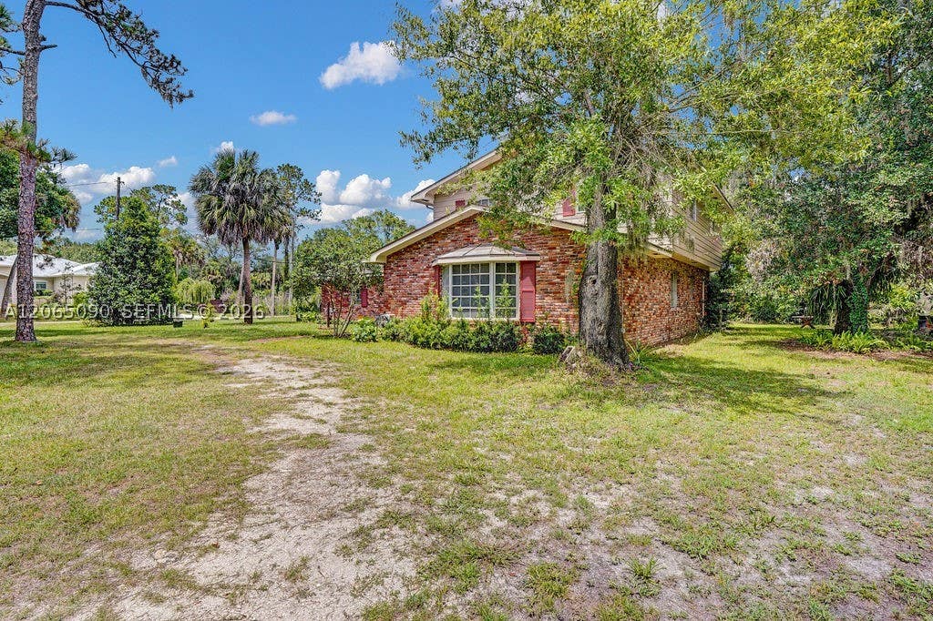 Photo of 4100 Sunrise Blvd, Fort Pierce, FL 34982 (MLS # A12065090)