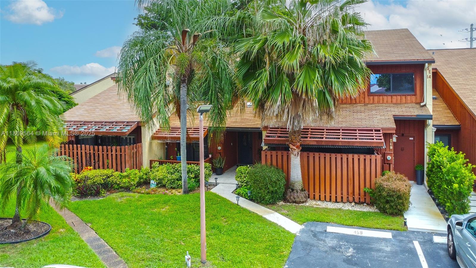 Beautifully remodeled townhouse featuring a modern kitchen with quartz countertops and stainless-steel appliances. Ceramic floors on the first level and laminate flooring flowing from the staircase throughout the second floor. Bathrooms have been tastefully updated, and the home offers abundant natural light. The master suite includes a private balcony overlooking the garden. Conveniently located near Walmart, Publix, top restaurants, and just minutes from the beach. Do not miss the 3d tour!. Easy to show.