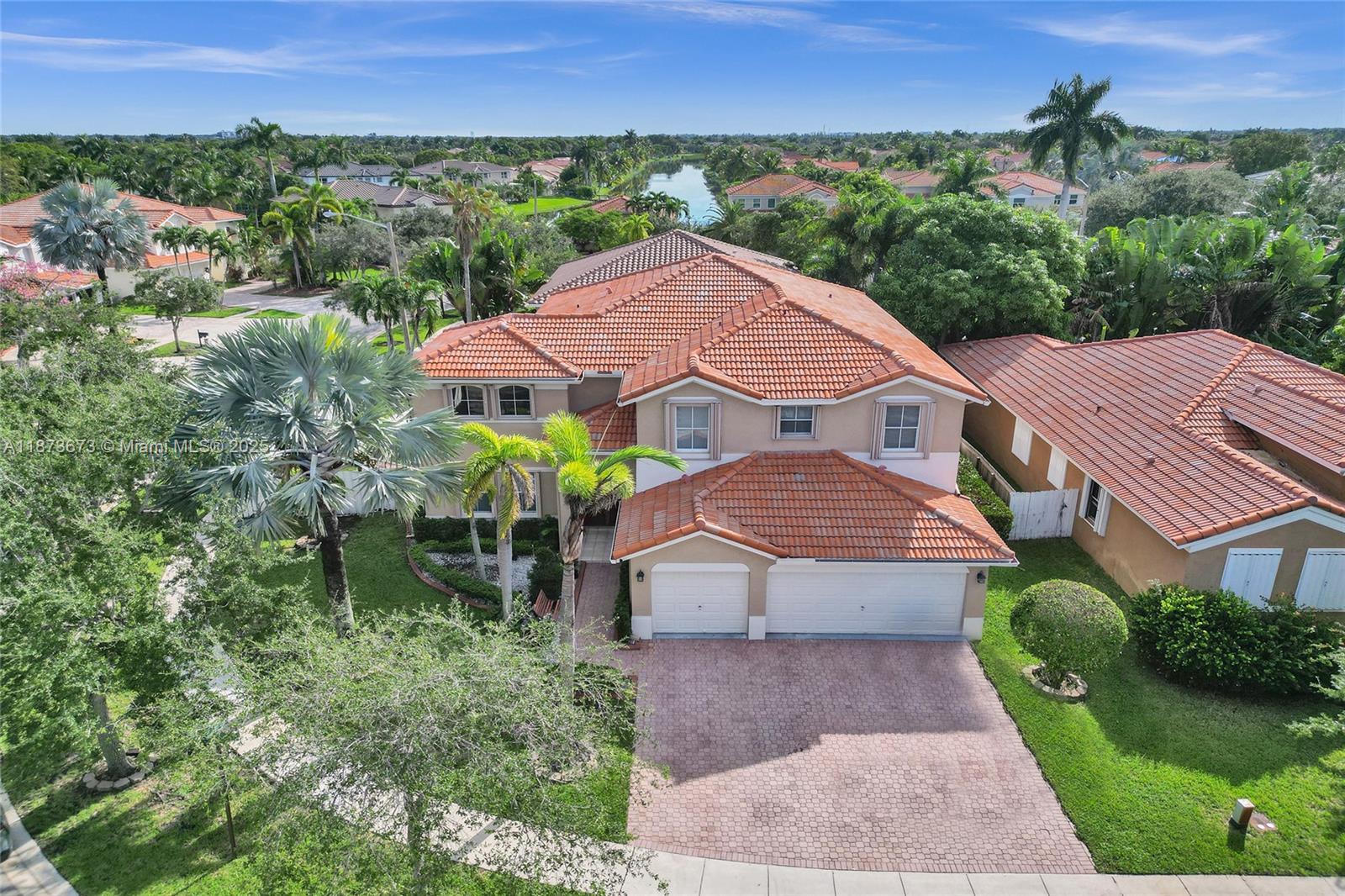 Welcome to 1379 NW 166th Ave – a spacious corner-lot home featuring 5 bedrooms one room dedicated to an office, 4 full baths, and a 3-car garage in a premier gated community.
The open floor plan offers two dining areas and a comfortable flow for entertaining. The first floor includes a private office with a full bath nearby, ideal for working from home. Upstairs, the primary suite boasts an updated bath with Jacuzzi tub, dual sinks, separate shower, and his-and-hers walk-in closets. Two bedrooms share a Jack-and-Jill bath, while another has its own private bath.
Enjoy outdoor living with a screened-in patio and sparkling pool, perfect for relaxing or hosting gatherings.