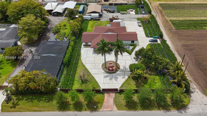 Amazing opportunity to own a house within the agricultural Suburbs, this home features 3 bed/2 bath at the main house , and 1 bed /1 bath casita or in law quarters perfect for extended family or to rent for extra income.The driveway is generously over sized circular with custom porte-cachere done 2 years ago.Outdoor oasis equipped with samsung appliances ,full kitchen ,wood cabinetry,granite countertoops in both kitchens and baths.Also half a bathroom outside.Polished marble floors throughout the interior.Outdoor living at its finest with custom built kitchen.Yellow pine tongue/groove ceilings with recessed lighting and travertine floors.All Impact and doors,aqua kleen water softnet/filter system. Wood composite fence ,fruit trees space for boat/RV.No HOA