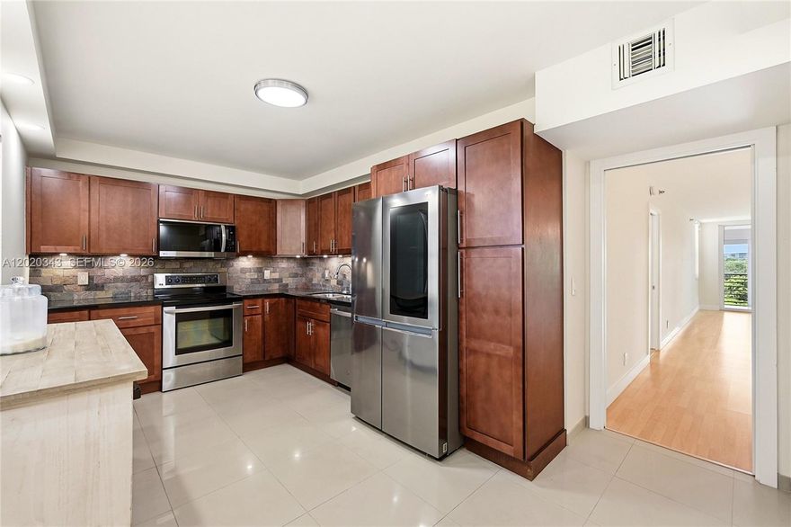 Beautiful views of golf course. All impact glass. Enclosed balcony. New washer and dryer and new appliances. Turnkey unit. Lots of storage in the unit and extra storage just outside the unit. Recently remodeled. Huge heated pool year round, barbecue area and tons of pathways to outdoor activities. Tennis courts, pickleball, volleyball and kids play area. Nearby entertainment as cassino, restaurants and shops. All ages welcomed.