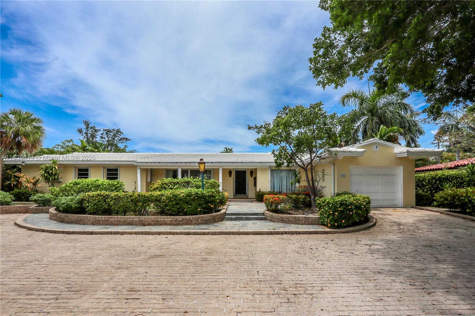 Incredible Opportunity! Hollywood Lakes home on a rare 112 x 138 double lot (over 15,000 sq ft)! Over 3,200 sq ft, this bright & spacious home offers 4 beds, 4 full baths, and a 1-car garage. Enjoy the oversized primary suite (800 sq ft) with a luxurious marble bathroom w/ a separate large walk-in shower, built-in sunken tub, double sinks, and 2 large walk-in closets. Eat-in kitchen includes a gas cooktop, double oven, breakfast nook, & plenty of natural light. Entertain effortlessly with a large pool, BBQ area, and spacious front driveway ( 9 cars) with Chicago brick and slate. Extra highlights include a split floor plan, two-zone A/C, tile roof, accordion shutters, and central vacuum. High elevation – never flooded. All this just 1.5 blocks from South Lake and close to the Intracoastal.