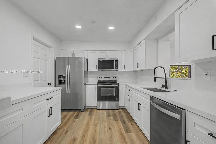 A FULLY RENOVATED single-family house UNDER $300/SF? In Miami??? YES! IT'S TRUE! This beautifully renovated 1,975 SF, 3 bed/3 bath home in the booming Little River neighborhood delivers style, substance, and value.
Recently completed with quality finishes throughout, the home features a stunning kitchen with wood shaker-style cabinetry, brand-new Whirlpool appliances, and a clean, modern aesthetic. The bathrooms are designer caliber. 
Equipped with hurricane impact windows and doors throughout and a 2020 central A/C system + new mini-split unit. The spacious primary suite features a massive walk-in closet and offers the potential to be converted into a separate apartment or in-law suite, creating an opportunity for rental income or multigenerational living. Situated on a sprawling 7,950 SF lot, there is ample room to add a pool and create your own private outdoor oasis. A true 1-car garage adds convenience and storage. Renovated and priced to sell, opportunities like this in Miami are rare!