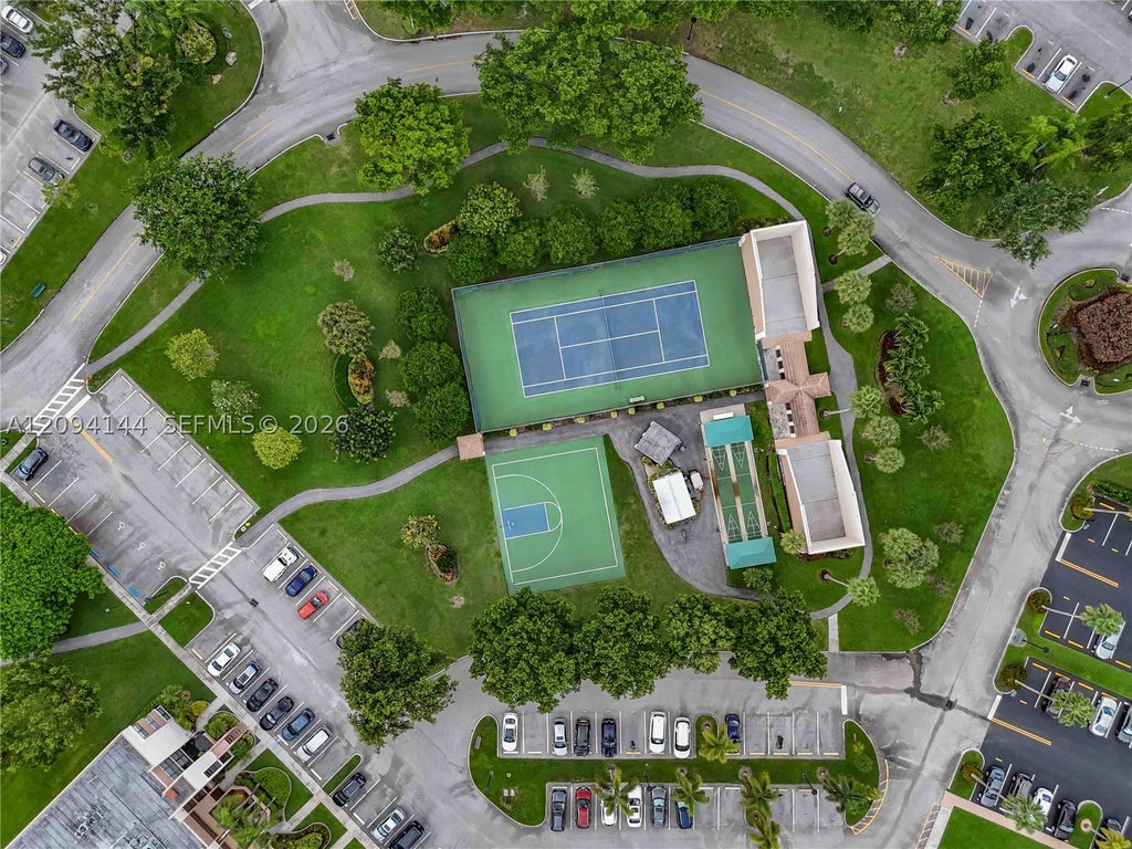 Photo of 10769 W Clairmont Cir #102, Tamarac, FL 33321 (MLS # A12094144)