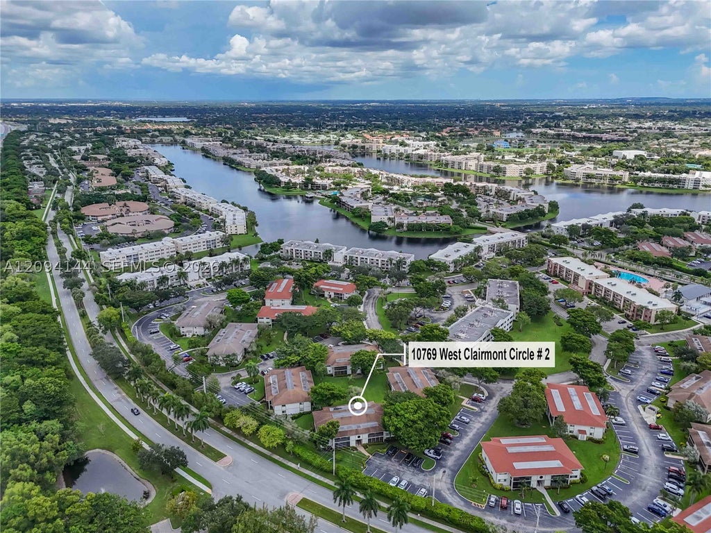 Photo of 10769 W Clairmont Cir #102, Tamarac, FL 33321 (MLS # A12094144)