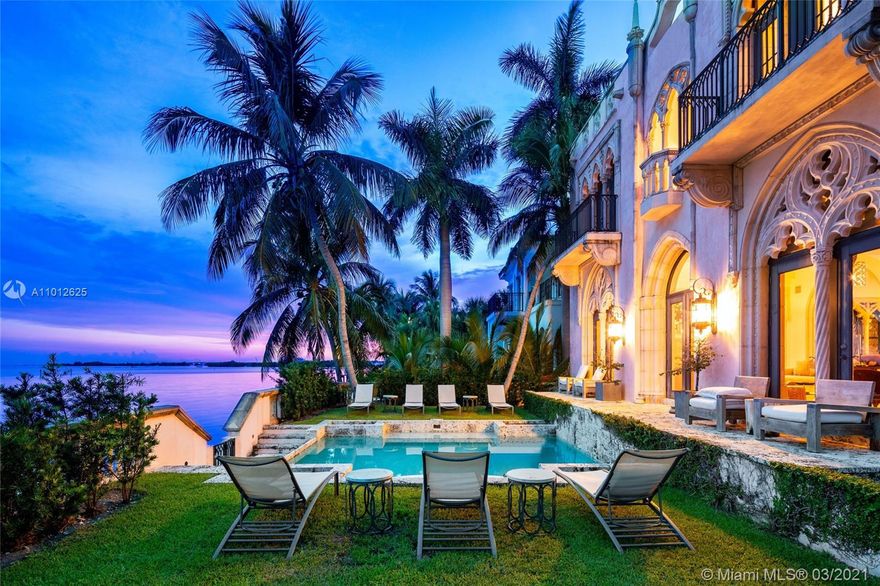 Your castle on the water awaits you. This completely custom-built 2009 estate combines Gothic architecture with contemporary finishes creating a modern fairytale waiting for you to call it happily ever after. Featuring over 12,000 square feet of living space, 6 bedrooms, 7 bathrooms, great hall, 30 foot vaulted ceiling, stone fireplaces, antique stained glass windows, French cast bronze chandeliers, Jerusalem stone floors, Cast stone window tracery, gourmet chef’s kitchen with La Cornue stove, keystone-edged infinity pool, elevator, rooftop sundeck, and cement dock. A must own for anyone passionate about architecture looking for that perfect harmony between the old world and the new. An incredibly rare architectural statement in South Florida.