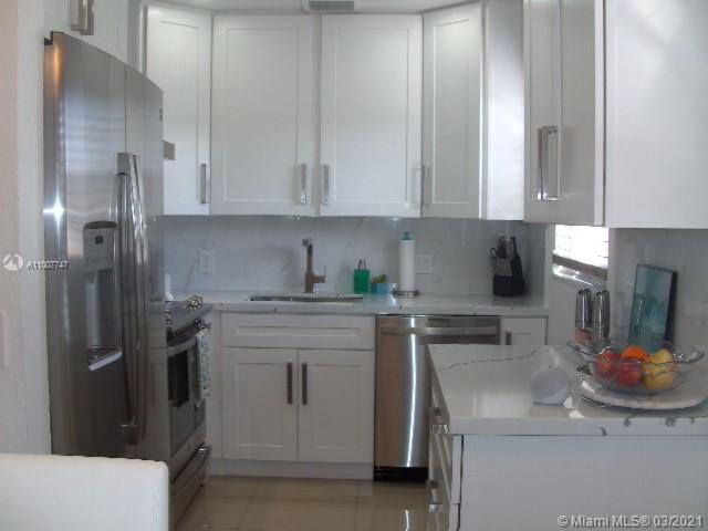 WOW WOW WOW YOU WILL LOVE THIS BRIGHT DIAMOND DOLLHOUSE. TOTALLY UPGRADED AND MORE. PORCELAIN TILES THROUGHOUT. QUARTZ KITCHEN SS APPLIANCES. NO DOME HERE. CORNER UNIT OFF MAIN ROAD. CONDO IS GORGEOUS WITH TOO MANY EXTRAS TO NAME. UPGRADED KIT W/QUARTZ AND JARLIN SHAKER WOOD CABINETS. EXTRA KITCHEN CABINET SPACE. RECESSED LIGHTING & WINDOWS IN KITCHEN. ALSO AC IN KIT. DEEP SINK & HIGH END HOOD ABOVE STOVE. IT BOASTS KNOCK DOWN WALLS NEW BASEBOARDS NEW WINDOW SILLS QUARTZ AND SOME NEW DOORS. BOTH BATHROOMS ARE UPGRADED WITH GRANITE NEW TILES & BEAUTIFUL BACKSPASH. TOILETS ARE HIGHER HEIGHT. ENCLOSED PATIO IS SIMPLY WONDERFUL DECORATED BEACH STYLE. SELLING FURNISHED. THIS CONDO IS ON THE 2ND FLOOR WITH A LIFT/MINI ELEVATOR. THIS IS THE GEM YOU HAVE BEEN LOOKING FOR. CALL FOR PRIVATE SHOWING.
