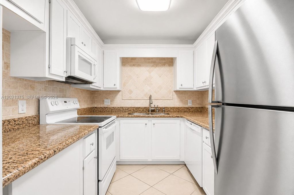 Photo of 5961 N Falls Cir Dr #309, Lauderhill, FL 33319 (MLS # A12021375)