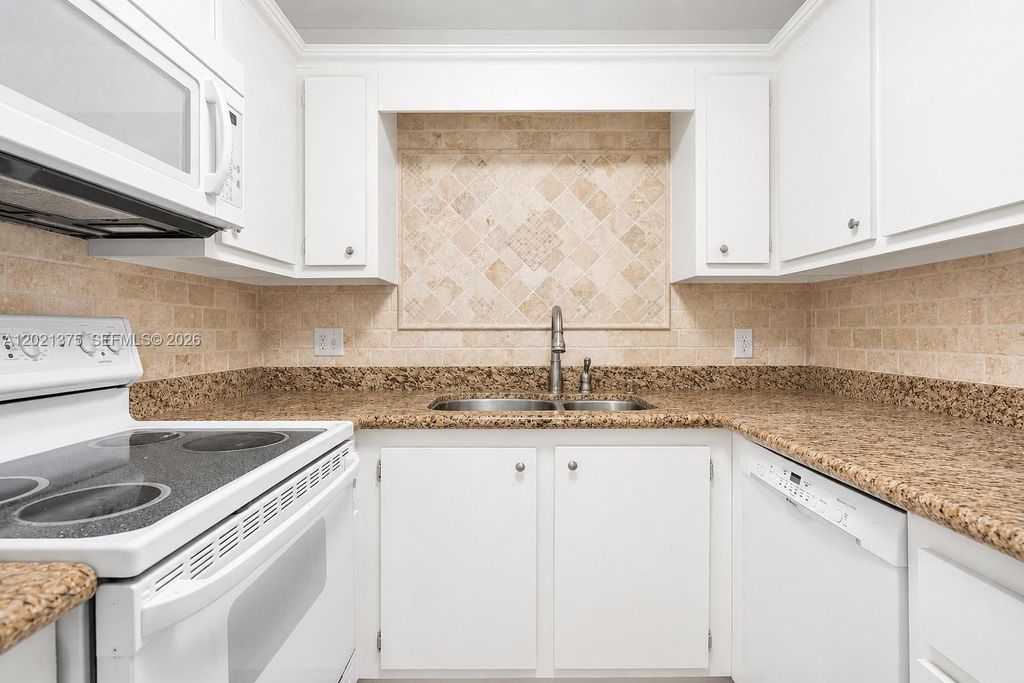 Photo of 5961 N Falls Cir Dr #309, Lauderhill, FL 33319 (MLS # A12021375)