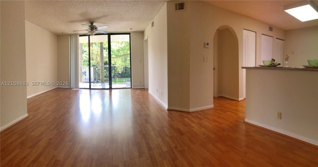 Photo of 10121 W Sunrise Blvd #204, Plantation, FL 33322 (MLS # A12108483)