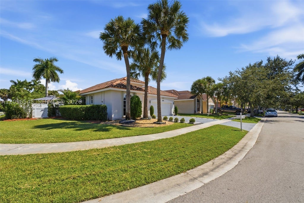 Photo of 1391 NW 185th Ter, Pembroke Pines, FL 33029 (MLS # A12096545)