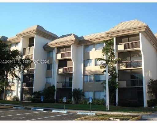 Photo of 731 N Pine Island Rd #305, Plantation, FL 33324 (MLS # A12044945)